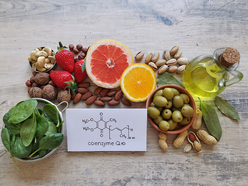 Natural food sources rich in CoQ10 include berries, nuts, citrus fruits, and spinach.